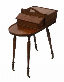 LATE 19TH-CENTURY ENGLISH OAK BUTLERâ€™S CUTLERY BOX ON LEGS AND CASTORS