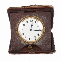 VICTORIAN BRASS-MOUNTED DESK CLOCK ENCLOSED IN A LEATHER CASE