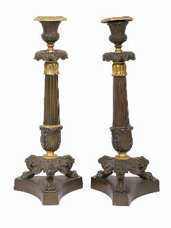 PAIR OF FRENCH EMPIRE ORMOLU AND BRONZE CANDLESTICKS