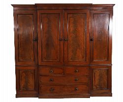 SUPERB GEORGIAN MAHOGANY AND EBONY STRING-INLAID BREAKFRONT WARDROBE