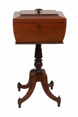REGENCY PERIOD MAHOGANY TEAPOY OF SARCOPHAGUS FORM