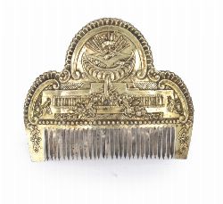 A 19TH-CENTURY BRASS HAIR COMB