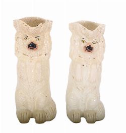 PAIR OF STAFFORDSHIRE POTTERY SEATED DOG MILK JUGS