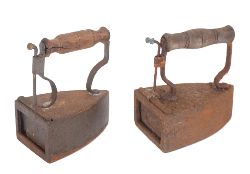 TWO 19TH-CENTURY STEAM IRONS WITH TURNED WOODEN HANDLES