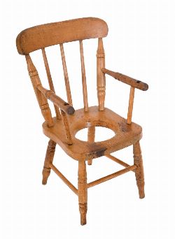 19TH-CENTURY PINE WINDSOR CHILDâ€™S TRAINING CHAIR