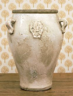 LARGE GLAZED POTTERY STORAGE JAR WITH APPLIED HANDLES AND RELIEF MEDALLION
