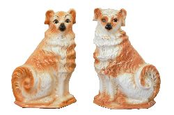 PAIR OF STAFFORDSHIRE SEAT DOGS