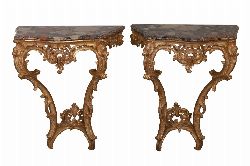 PAIR OF 19TH-CENTURY CARVED GILTWOOD CONSOLE TABLES, EACH WITH MARBLE TOP