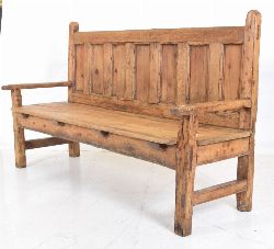 19TH-CENTURY IRISH PINE SEVEN-PANEL BACK BENCH