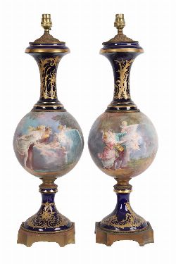 PAIR OF 19TH-CENTURY ORMOLU-MOUNTED SÃˆVRES PORCELAIN-STEMMED TABLE LAMPS