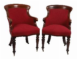 PAIR OF 19TH-CENTURY IRISH MAHOGANY SHOWFRAME LIBRARY CHAIRS