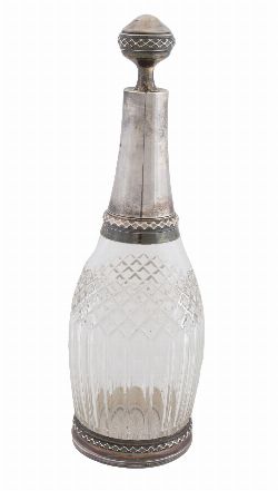 A LATE 19TH-CENTURY SILVER-MOUNTED CUT-CRYSTAL DECANTER AND STOPPER
