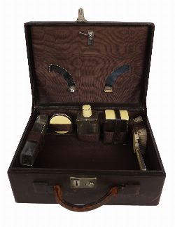 19TH-CENTURY LADYâ€™S VANITY SET IN ORIGINAL LEATHER CASE