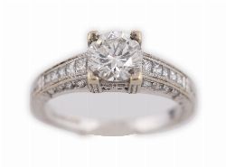 18CT WHITE GOLD DIAMOND SOLITAIRE RING