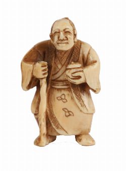 JAPANESE FIGURE WITH STAFF