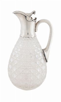 EDWARDIAN IRISH CRYSTAL AND SILVER-MOUNTED CLARET JUG

