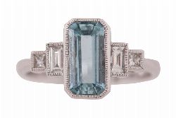 18CT WHITE GOLD AQUAMARINE AND DIAMOND RING
