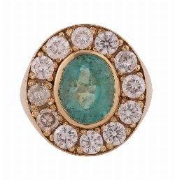 18CT GOLD EMERALD AND DIAMOND RING