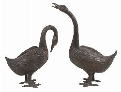 PAIR OF LIFESIZE BRONZE GEESE