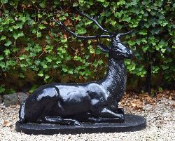 CAST-IRON FIGURE OF A RECUMBENT STAG