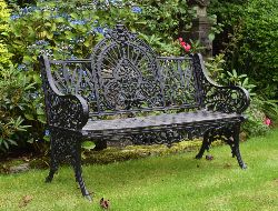 CAST-IRON ARCHED-BACK GARDEN SEAT