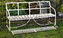 19TH-CENTURY WROUGHT-IRON GARDEN SEAT AND FOOTREST