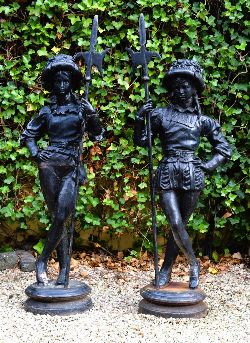 PAIR OF CAST-IRON FIGURES OF HALBERDIERS