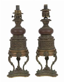PAIR OF 19TH-CENTURY BRONZE AND BRASS OIL LAMPS