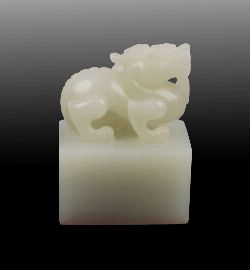CHINESE BUDDHIST LION OFF-WHITE JADE SEAL