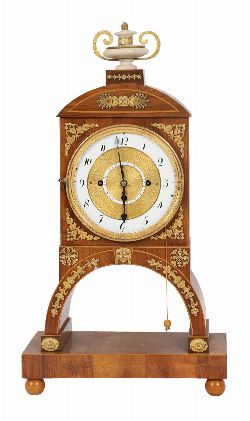 EMPIRE PERIOD ORMOLU MOUNTED MAHOGANY PORTICO CLOCK