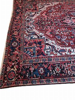 EARLY 20TH-CENTURY NORTH-WEST PERSIAN HERIZ WOOL CARPET