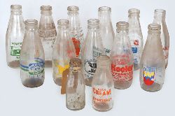COLLECTION OF MILK BOTTLES