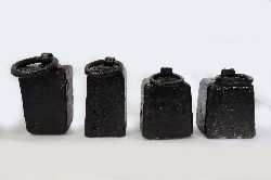 FOUR ANTIQUE WEIGHTS WITH HANDLES