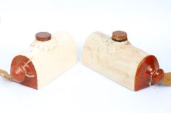 TWO EARTHENWARE HOT WATER BOTTLES