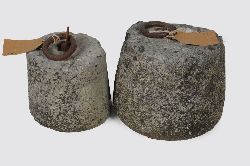 TWO LIMESTONE WEIGHTS WITH HANDLES