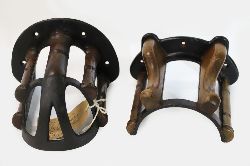GROUP OF TWO VICTORIAN CAST IRON AND WALNUT WALL-MOUNTED SADDLE RACKS 