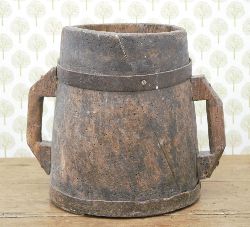 LARGE DUG OUT METAL-BOUND VESSEL