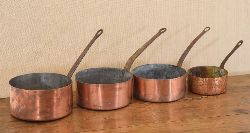 SET OF 4 GRADUATED COPPER AND IRON COOKING PANS