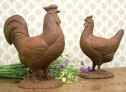 PAIR OF CAST IRON SCULPTURES: HEN AND ROOSTER
