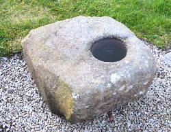19TH-CENTURY HEALING STONE