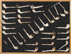 COLLECTION OF 36 MOUNTED CLAY PIPES