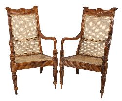 PAIR OF 19TH-CENTURY CARVED AND CANED COLONIAL ARMCHAIRS