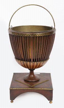 REGENCY MAHOGANY AND BRASS INLAID OYSTER BUCKET ON STAND