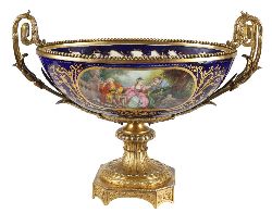 ORMOLU-MOUNTED SEVRES PORCELAIN CENTREPIECE