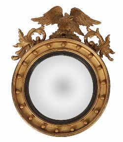 REGENCY CARVED GILTWOOD CONVEX MIRROR WITH EAGLE CREST