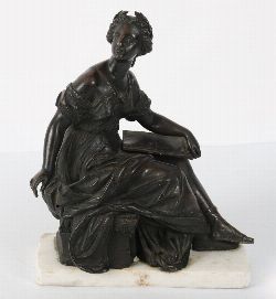 BRONZE FIGURE OF A SEATED MUSE WITH LAUREL WREATH