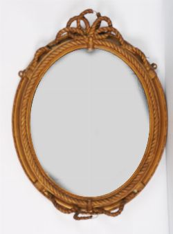 18TH-CENTURY STYLE CARVED GILTWOOD OVAL MIRROR