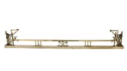 LARGE EDWARDIAN BRASS FENDER