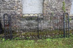 PAIR OF SIMPLE ARCHED WROUGHT IRON GATES