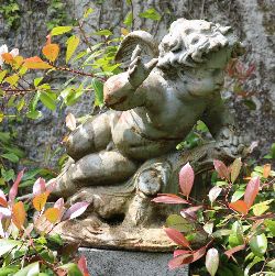 19TH-CENTURY CAST IRON WINGED CHERUB